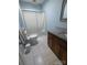 Well-lit bathroom featuring a granite countertop vanity, a tub-shower combo, and neutral flooring at 936 New Camp Creek Church Rd # 11, Kings Mountain, NC 28086