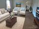 Comfortable living room with decorative rug, stylish furniture, and natural light at 936 New Camp Creek Church Rd, Kings Mountain, NC 28086