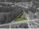 An aerial view displays the property within its lot lines, showcasing the expansive yard at 1070 Nc 182 Hwy, Lincolnton, NC 28092