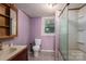 Modest bathroom includes a classic toilet, vanity, and a functional stand-up shower at 1070 Nc 182 Hwy, Lincolnton, NC 28092