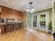 Inviting kitchen with a breakfast bar, stainless steel appliances, and French doors to the deck at 10710 Bristlecone Ct, Mint Hill, NC 28227