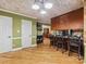 Open kitchen with barstool seating, stainless appliances, and decorative ceiling at 10710 Bristlecone Ct, Mint Hill, NC 28227