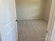 Cozy bedroom featuring soft carpet and freshly painted walls, ready for personalization at 108 Red Juniper Way, Statesville, NC 28625