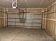 Spacious garage with overhead door and ample room for parking and storage at 108 Red Juniper Way, Statesville, NC 28625