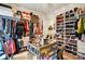 Spacious closet with custom shelving for clothing, shoes, and accessories at 10903 Skymont Dr, Huntersville, NC 28078