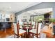 A dining room that is open to the kitchen, living room, and has a view of the backyard at 10903 Skymont Dr, Huntersville, NC 28078