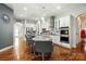 A kitchen with granite countertops, stainless appliances, and an island with seating at 10903 Skymont Dr, Huntersville, NC 28078