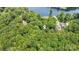 Aerial view of a wooded lot with lake access, perfect for building a secluded retreat at 1102 Lake Montonia Rd, Kings Mountain, NC 28086