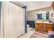 Bathroom featuring a floral wall design, vanity, and shower with a curtain, offering functionality at 1102 Lake Montonia Rd, Kings Mountain, NC 28086