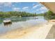 Scenic view of the beach with a swimming platform, offering a wonderful waterfront lifestyle at 1102 Lake Montonia Rd, Kings Mountain, NC 28086