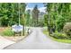 Welcoming entrance to Lake Montonia Club, Inc. with established landscaping and clear signage at 1102 Lake Montonia Rd, Kings Mountain, NC 28086