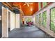 Bright living area featuring a wooden ceiling, large windows, and natural lighting at 1102 Lake Montonia Rd, Kings Mountain, NC 28086