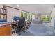 Large office space featuring natural light, backyard views and spiral staircase at 1102 Lake Montonia Rd, Kings Mountain, NC 28086