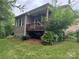 Outdoor living on the deck with a hammock underneath, perfect for relaxation at 1124 Greenbridge Dr, Matthews, NC 28105