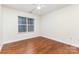 Neutral bedroom with hardwood floors and natural light at 1136 W 1St St, Charlotte, NC 28202
