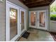 Enclosed patio features double glass doors for ample natural light at 1136 W 1St St, Charlotte, NC 28202