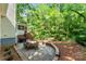 Beautiful backyard with a patio and lush greenery at 116 Oak Creek Dr, Charlotte, NC 28270