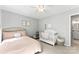 This bedroom features a cozy crib, soft lighting, and neutral tones, creating a calming and inviting space at 116 Oak Creek Dr, Charlotte, NC 28270