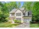 Well-maintained two-story home with an attached garage and manicured lawn at 116 Oak Creek Dr, Charlotte, NC 28270