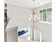 Bright foyer with a modern chandelier, hardwood floors, and view of the entry at 116 Oak Creek Dr, Charlotte, NC 28270