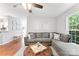 Comfortable living room with a large sectional sofa, hardwood floors and decor at 116 Oak Creek Dr, Charlotte, NC 28270