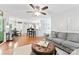 Open-concept living room seamlessly connects to the kitchen and dining area at 116 Oak Creek Dr, Charlotte, NC 28270