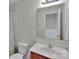 Functional bathroom with a well-lit vanity mirror at 117 Langhorne Dr, Mount Holly, NC 28120