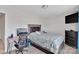 Comfortable bedroom featuring a desk, TV, and modern furnishings at 117 Langhorne Dr, Mount Holly, NC 28120