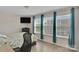 Bright bedroom with natural light and contemporary decor, including a wall-mounted TV at 117 Langhorne Dr, Mount Holly, NC 28120