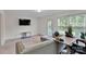The spacious living room with carpet and TV at 117 Langhorne Dr, Mount Holly, NC 28120