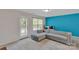 The spacious living room with a comfortable sofa at 117 Langhorne Dr, Mount Holly, NC 28120