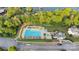 Aerial shot of the community pool, clubhouse, and parking, creating a resort-style living experience at 117 Langhorne Dr, Mount Holly, NC 28120