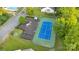 Aerial view of the community amenities: tennis court, playground and well-maintained green spaces at 117 Langhorne Dr, Mount Holly, NC 28120