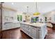 Spacious white kitchen with marble countertops and stainless steel appliances at 11710 Ney Manor Way, Charlotte, NC 28277