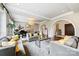 Well-appointed living room featuring a grand piano, fireplace, and comfortable seating at 11710 Ney Manor Way, Charlotte, NC 28277