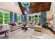 Spacious living room with vaulted ceilings, wood beams and lots of natural light at 11710 Ney Manor Way, Charlotte, NC 28277