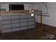 Spacious garage features ample storage, including overhead shelving and an automatic garage door at 134 Crystal Cir, Mooresville, NC 28117