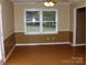 Spacious living room features two windows offering great natural light at 134 Crystal Cir, Mooresville, NC 28117