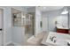 Bathroom featuring tub, walk-in shower, tile floor, and neutral wall color at 1355 Cilantro Ct, Fort Mill, SC 29708