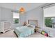 Brightly lit bedroom with carpet, natural lighting, and a pendant light at 1355 Cilantro Ct, Fort Mill, SC 29708