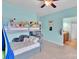 bedroom featuring bunk beds, soft blue walls and access to a bathroom at 1355 Cilantro Ct, Fort Mill, SC 29708