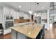 Bright and modern kitchen with an island, stainless steel appliances, and plenty of cabinet space at 1355 Cilantro Ct, Fort Mill, SC 29708