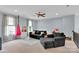 Spacious Living Room with cozy furniture, carpet and large windows at 1355 Cilantro Ct, Fort Mill, SC 29708