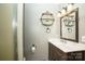 Bathroom features a toilet, vanity with mirror, and walk-in shower at 1565 Earnhardt Rd, Salisbury, NC 28146