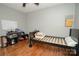 Bedroom with a ceiling fan, hardwood floors and single twin bed at 1565 Earnhardt Rd, Salisbury, NC 28146