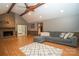 Cozy living room with brick fireplace, wood accents, and ample natural light at 1565 Earnhardt Rd, Salisbury, NC 28146