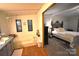 View of the bathroom with a large soaking tub, which opens to the bedroom at 1789 Paris Dr, Conover, NC 28613