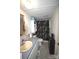 Bathroom with a vanity, cabinet, toilet, and shower area with a floral curtain at 1789 Paris Dr, Conover, NC 28613