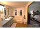 Bathroom area with a large soaking tub, which opens to the bedroom at 1789 Paris Dr, Conover, NC 28613