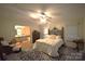 Cozy bedroom with ceiling fan, spacious layout, and convenient access to an ensuite bathroom at 1789 Paris Dr, Conover, NC 28613